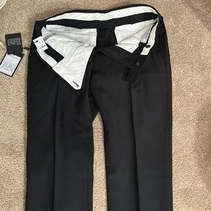 Men’s black slacks size 28 brand new with tags unfinished hem